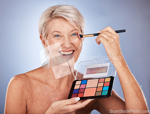 Image of Makeup, portrait and senior woman with brush to apply luxury product, facial cosmetics or anti aging skincare. Healthcare, wellness and happy elderly model with aesthetic foundation pallet for beauty