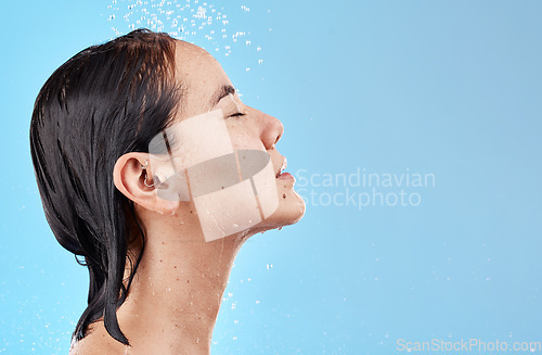 Image of Heath, hair and woman in shower on blue background with mockup, advertising or product placement space. Haircare, water and skincare, hygiene routine in the morning asian woman with clean lifestyle.