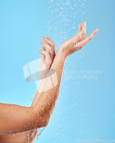 Image of Hand, shower and water with a woman cleansing her body for skincare, bodycare and washing. Hygiene, grooming and showering female arm for health, wellness and skin care, body care and hydration