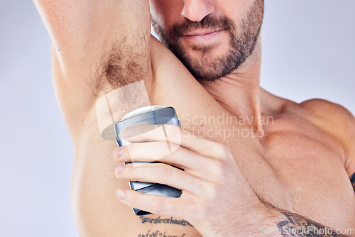 Image of Deodorant, wellness and health with armpit of man for clean, hygiene routine and sweat. Antiperspirant, skin and smell with underarm of model for body care, confidence and grooming in gray background