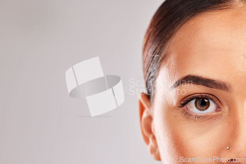 Image of Brown eye, woman and face vision in retina security, facial eyelash mascara or makeup cosmetics on skin. Zoom detail, texture or beauty model eyes with contact lenses, idea or innovation for humanity