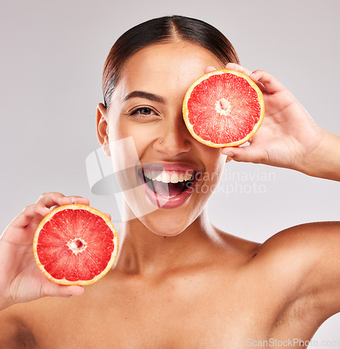 Image of Grapefruit, woman skincare and beauty, vitamin c and wellness, healthy facial aesthetics and natural cosmetics of dermatology on studio background. Portrait happy model, body nutrition and detox diet