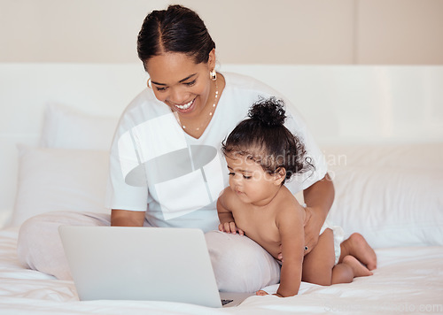 Image of Mother, crawling baby and laptop on bed of black family bedroom of freelancer working from home on maternity leave. Happy mom, love and remote work job with child development, learning and exercise