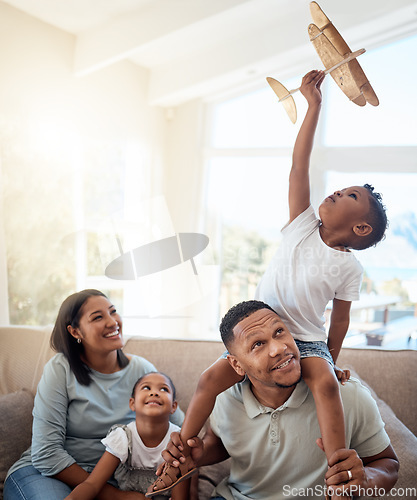 Image of Happy family playing living room with toy airplane for fun games, freedom and energy together in family home. Parents, kids and flying aeroplane toys to dream for travel, easy lifestyle and happiness