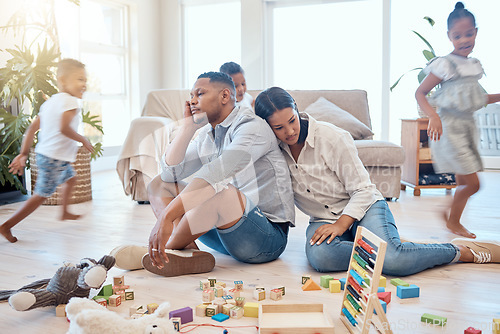 Image of Tired parents, children playing in living room and running in with adhd energy, burnout parents and happy kids run for crazy fun. Child development, growing up and play in lounge family home together