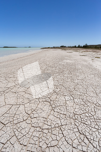 Image of Tsimanampetsotsa Lake with dry, cracked beach. Madagascar wilderness landscape.