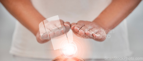 Image of Hands, light energy and chakra healing for spa healthcare and luxury wellness. Woman palm, reiki therapy and spiritual aura expert or healthy power balance for calm lifestyle with body wellbeing