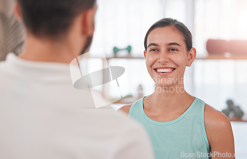 Image of Physiotherapy, consultation and woman talking with therapist in clinic for treatment advice. Healthcare, wellness and happy female patient consulting medical chiropractor for rehabilitation options.