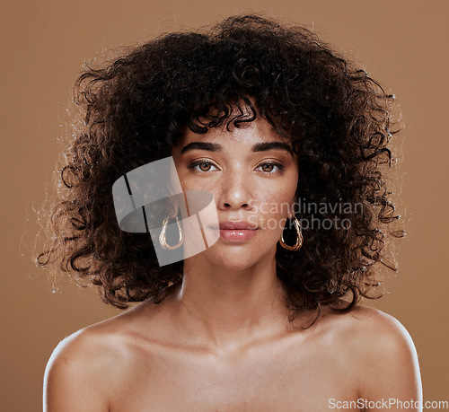 Image of Portrait, skincare and black woman in studio for hair, skin and beauty, grooming and hygiene on brown background. Face, wellness and girl model with natural, afro and glam cosmetic with makeup