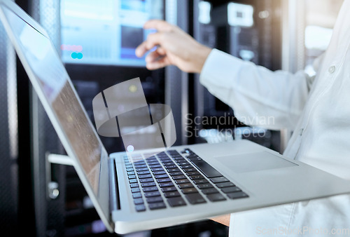 Image of Server room, network and laptop with businessman in data center for engineering, technology and cloud computing. Cybersecurity, internet and mining with hands of employee for hardware maintenance