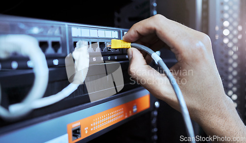 Image of Hands, network engineer and server cable in server room for data, internet or web connection. Cyber security, system administrator and maintenance of computer wire to prevent error, glitch or issues