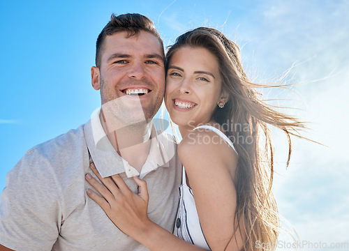 Image of Happy couple, love and travel on a summer vacation on a blue sky for freedom, energy and fun for a healthy marriage. Portrait of a man and woman outdoor with a smile, commitment and fun on holiday