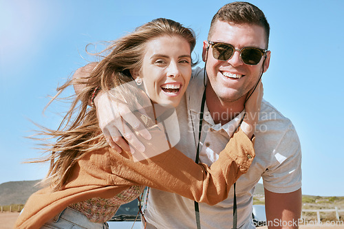 Image of Love, hug and portrait of a happy couple on road trip, vacation or adventure for summer. Happiness, fun and young man and woman embracing while on an outdoor journey or holiday together in Australia.