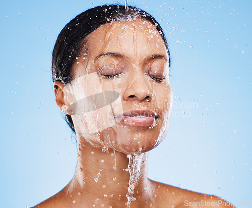 Image of Beauty, skincare and shower with black woman and water splash for cleaning, hydration and natural cosmetics. Moisture, fresh and relax with face of girl model for product, self care and luxury