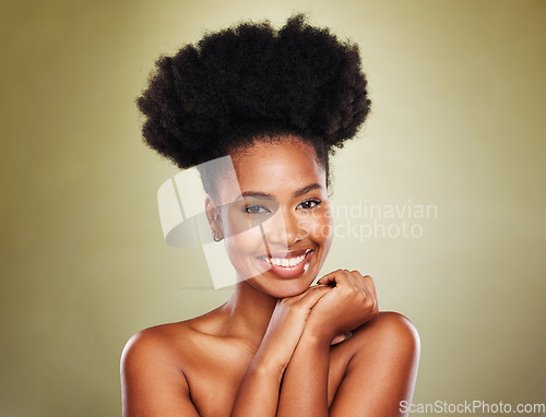 Image of Black woman afro, beauty and smile for skincare cosmetics or makeup against a studio background. Portrait of African American female face smiling with teeth in satisfaction for facial skin treatment