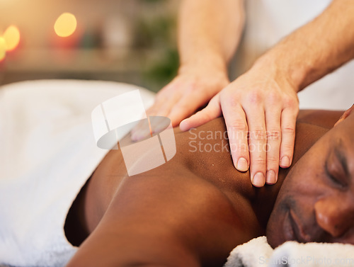 Image of Black man, relax and massage at spa for health, wellness and sleeping rest at luxury resort. African man, salon bed and physical therapy for healing, holistic treatment and zen on holiday vacation