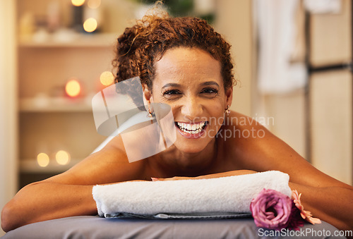 Image of Spa, wellness and woman in massage and body therapy portrait, happy and relax with stress relief and self care. Happiness, luxury and holistic treatment, health and relaxation with massage therapy.