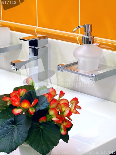 Image of Interior of bathroom - basin and faucet