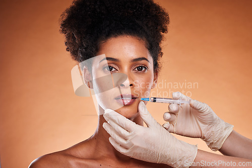 Image of Plastic surgery, botox and portrait of woman with lip filler for beauty, aesthetic goals and face augmentation. Black model, hyaluronic acid and hands of medical doctor with dermal filler injection