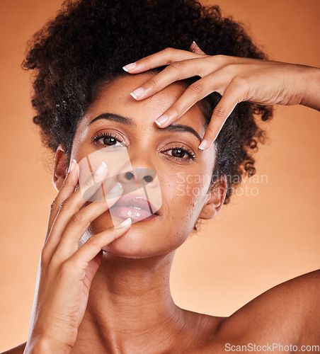 Image of Face portrait, skincare and beauty of black woman in studio isolated on an orange background. Makeup, luxury cosmetics and female from South Africa touching skin for facial wellness and healthy skin