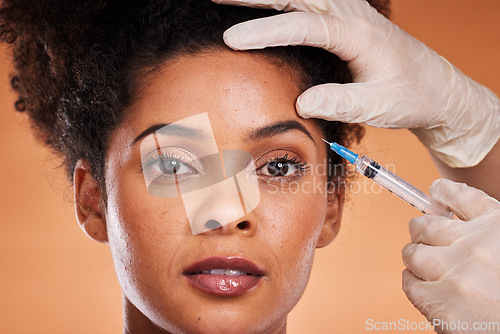 Image of Syringe, skincare and black woman with plastic surgery, medical and collagen injection from doctor. Portrait of a skin wellness, health and dermatology model patient with eyebrow and wrinkle filler