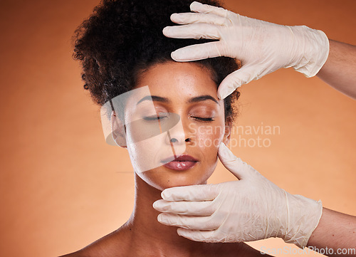 Image of Plastic surgery, cosmetics and black woman in studio with medical hands for botox, aesthetic or facial dermatology help, support and trust. Mesotherapy, hyaluronic acid or collagen of girl model face