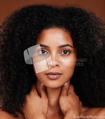 Image of Skincare, beauty and portrait of a black woman in a studio for a natural, organic and healthy skin treatment. Health, wellness and headshot of African woman with a facial routine by brown background.
