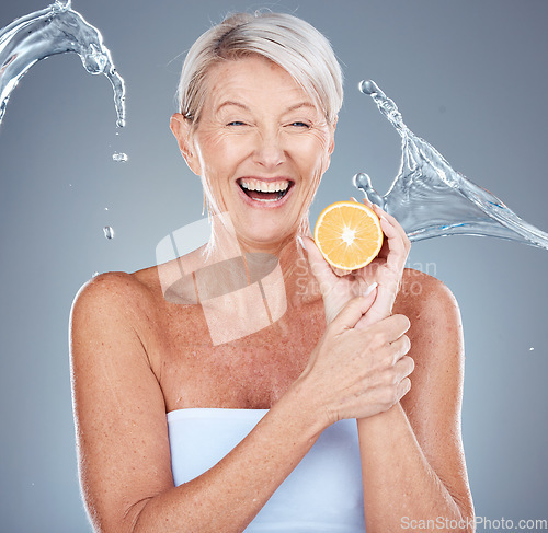 Image of Face, lemon and skincare senior woman in studio portrait with water splash mockup for facial, antiaging glow and healthy food cosmetics. Elderly model, vitamin c lime fruit and dermatology skin care