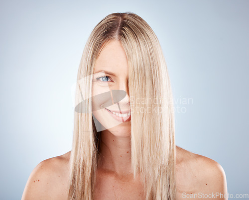 Image of Hair, woman and portrait of blond lady with healthy hair for beauty and haircare. Hair care, hairstyle and face of blonde female for cosmetology or wellness on a grey studio background