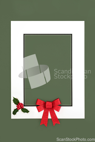 Image of Christmas Red Bow and Holly Berry Background Frame 