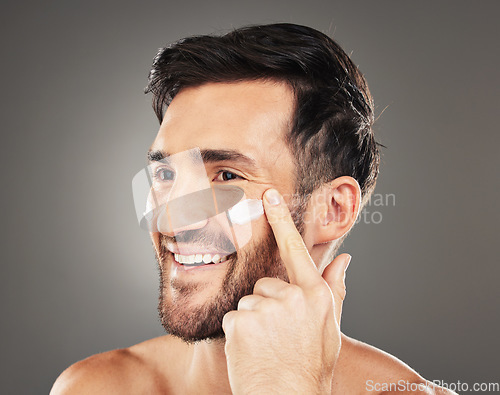 Image of Beauty, sunscreen and face of man with cream product for health, moisturizing and skin hydration. Happy, healthy and skincare lifestyle routine of model on dark gray studio background.