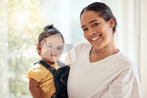 Image of Love, mother holding girl and portrait being happy, bonding and loving together to relax. Motherhood, mama and daughter have quality time, happiness and carry child with care and a smile