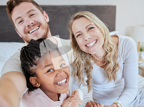 Image of Love, adoption and selfie portrait of happy family mother, father and black child relax in home bedroom for morning fun. Happiness, smile and photo memory of modern diversity people, parents and kid