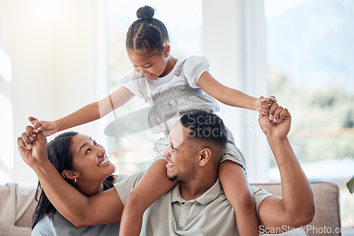 Image of Family, love and children with a mother, father and daughter bonding or playing on a sofa in the living room of their home. Kids, happy and smile with a man, woman and girl spending time together