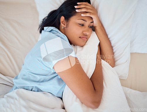 Image of Depression, sleeping and woman in bed with mental health problem, burnout and tired student thinking of life challenge and wellness. Sad, depressed or fatigue girl with pillow in her bedroom above