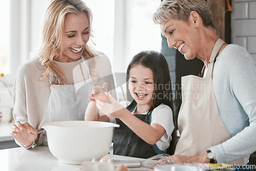 Image of Family, baking and child helping mother and grandmother with cooking with an egg in bowl for future as chef or baker. Woman, senior woman and girl learning to make cake, food or breakfast in kitchen