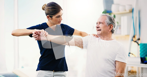 Image of Physiotherapy, consultant and exercise with a woman physio and senior man patient in a clinic for rehabilitation. Fitness, healthcare and wellness with a mature male in session with a physiotherapist