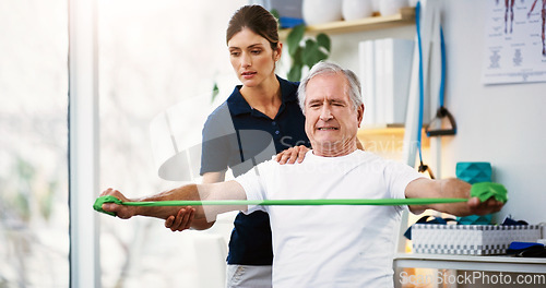 Image of Physiotherapy, senior man and doctor exercise, resistance band and workout for muscle rehabilitation in a clinic. Physiotherapist, elderly patient and training, stretching muscles and body fitness