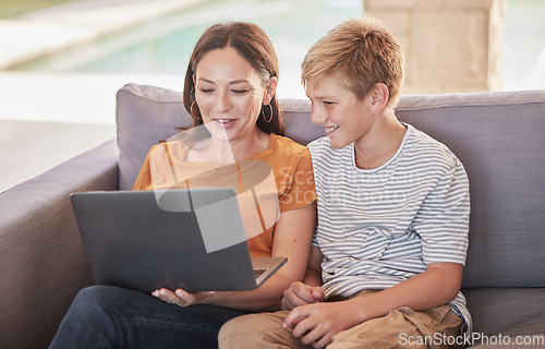 Image of Mother, son and laptop watching movie, online and subscription, relax and happy on sofa together in home. Mom, boy and bonding, social media and fun while browsing internet and funny meme or post