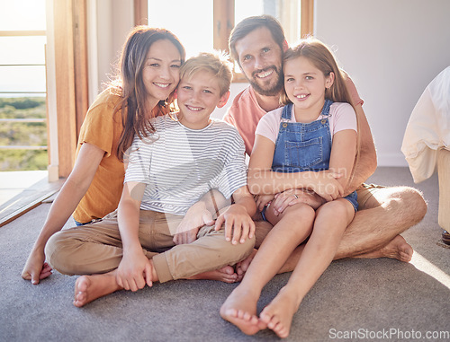 Image of Relax, happy and portrait of family on floor of bedroom for weekend, bonding and affectionate. Smile, quality time and support with parents and children at home for youth, lifestyle and having fun