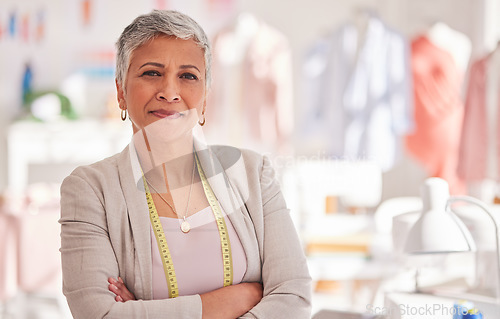 Image of Creative, fashion and designer with portrait of business woman with arms crossed fo retail, tailor or textile industry. Factory, ecommerce and management with employee in workshop for studio boutique