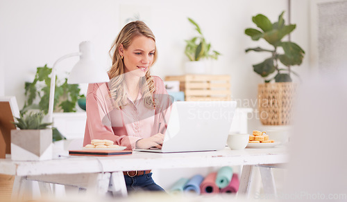 Image of Laptop, business woman and front desk worker writing email, check schedule and appointment at desk. Happy, professional and receptionist smile, relax and enjoy working at legal firm, content and calm