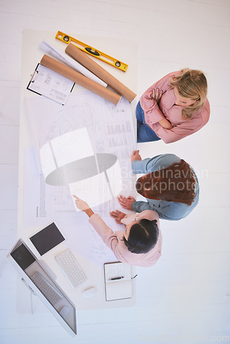 Image of Top view, teamwork and architects with blueprint in office for construction project from above. Meeting, architecture and development planning of contractors or engineers with building design sketch.