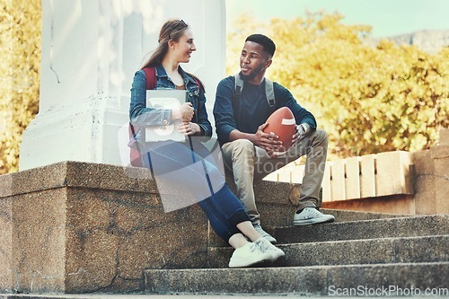 Image of Students, friends and talking or bonding on university campus outside for knowledge and education. Woman, man and college student people conversation about schoolwork and sport or football
