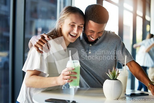 Image of Dating, restaurant and couple with smoothie drink hugging, having fun and laughing together on romantic date. Love, relationship and interracial couple enjoying milkshake, cocktail and juice in cafe