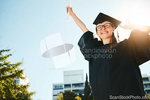 Image of Woman, student and graduate for university achievement, scholarship or success for grades at the campus. Happy female in celebration for graduation, certificate or diploma for academic qualifications