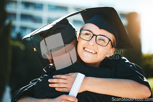 Image of Hug, graduation and student achievement, happy or smile for success outdoor in gown. Graduate, academic or embrace for diploma, happiness or certificate completed at university, college and education