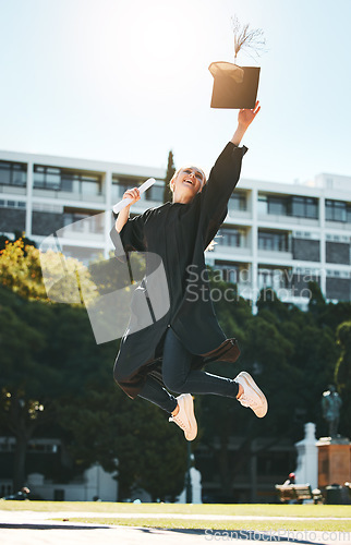 Image of Woman graduation, jump and celebrate at college, school or university with certificate in sunshine. Student graduate, scholarship or diploma in success, celebration or education while happy at campus