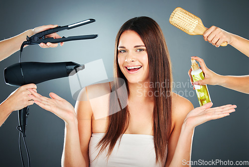 Image of Beauty, hair care and woman in studio for hairdresser and salon choice or decision with hairdryer, hair straightener and tools. Portrait of happy model with mockup hands for self care cosmetics