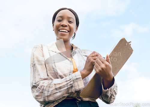 Image of Farm, portrait and woman farmer with a checklist on a clipboard to monitor the growth of produce. Sustainable, agriculture and agro African girl working in a eco friendly environment on a field.